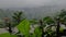 The thin fog that fell covering the village as seen from the buildings on higher ground