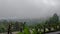 The thin fog that fell covering the village as seen from the buildings on higher ground