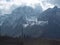 Thin ice cover on overlap blue mountain in kashmir,india