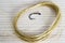 Thin Kevlar leash coiled rings and carp fishing hook.