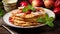 Thin pancakes with apples and topping. Delicious hearty food, Shrovetide menu.