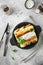 Thin pancakes with fillings. tasty stuffed pancakes crepes with cabbage closeup. Russian Fried Stuffed Pancakes Blintzes with