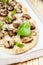 Thin pizza with mushrooms and cheese, pita