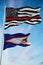 Thin Red Line Black Flag of US with smaller flag of American Samoa state, Usa at cloudy sky background. United states of America