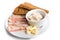 Thin sliced raw salted bacon served with lard, garlic, bread on a plate isolated on white background. Appetizer for borsch.