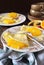 Thin soda water pancakes blinis with caramelized orange slices