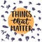 Things that matter - hand drawn lettering phrase on the polka dot grunge background. Fun brush ink inscription