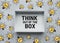 Think out of the box concepts with text in box and lightbulb drawing sign element