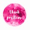 Think positive phrase handwritten lettering in pink watercolor circle