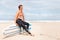 Thinking, beach and shirtless man with surfboard on space in wetsuit for sports, travel or fitness. Nature, vision and