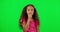 Thinking, kid wondering and green screen with youth, decision and choice of girl. Young child, doubt and confused with