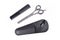 Thinning shears used to reduce hair thickness or blend layered hair, case and black comb on white background