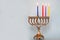 Third day of Hanukkah with burning Hanukkah colorful candles in Menorah.Chanukkah-jewish holiday.