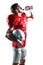 Thirsty American football player in red jersey drinking water