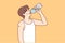 Thirsty man drinking water from bottle