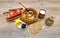 Thistle soup and other food on a wooden background