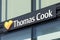 Thomas Cook signage above travel agency entrance