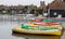 THORPENESS, SUFFOLK/UK - JUNE 1 : Group of rowing boats at Thorpeness boating lake in Suffolk on June 1, 2010