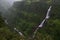 Thoseghar waterfall and dark mountain greenery