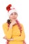 Thoughtful asian girl in santa\'s hat
