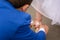 Thoughtful bride groom glued to foot patch