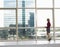 Thoughtful Businesswoman Looking Out Of Office