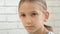 Thoughtful Child Portrait, Pensive Kid Face Looking in Camera, Blonde Bored Girl