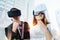 Thoughtful couple wearing virtual reality glasses