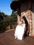 Thoughtful girl in white clothes sitting on the veranda