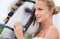 Thoughtful beside her steed. A stunning bride looking thoughtful alongside her stallion.