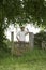 Thoughtful Man Standing Across Field Gate