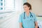 Thoughtful Nurse Looking Out Through Window