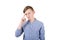 Thoughtful stressed teenage boy pointing finger to forehead isolated over white background. Hard thinking, anxiety and headache