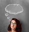 Thoughtful woman with cloud above her head