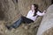 Thoughtful Woman Relaxing In Barn