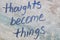 Thoughts become things graffiti written on a wall
