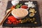 Thousand Island Dressing with ingredients on the slate board