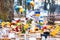 Thousands candles and flowers standing on the street during the war in Ukraine