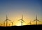 Thousands of wind turbines at sunset