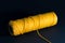 Thread spool with yellow thread