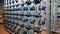 thread spools. textile industry. weaving factory. racks with many thread spools. dyeing and drying of threads for