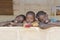 Three Adorable African Children Posing Outdoors Copy Space
