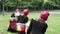 Three african women dancing folk dance in traditio.costumes with coats of skirts