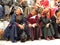 Three aged tibetan women pilgrims resting in Leh, India