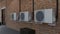 Three air conditioners on a brick wall. 3d