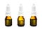 Three Amber dropper bottles with oil, medicine or other benefic