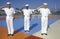 Three American Sailors Saluting