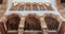 Three arches revealing three wooden domes decorated with floral patterns with interleaved wood window Mashrabiya, Beshtak palace