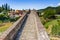 three archs medieval humpback bridge in Italy