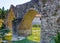 three archs medieval humpback bridge in Italy